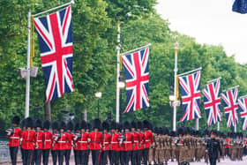 Members of the Royal Navy, British Army, and Royal Air Force conduct a final early morning rehearsal through London ahead of the Platinum Jubilee Pageant