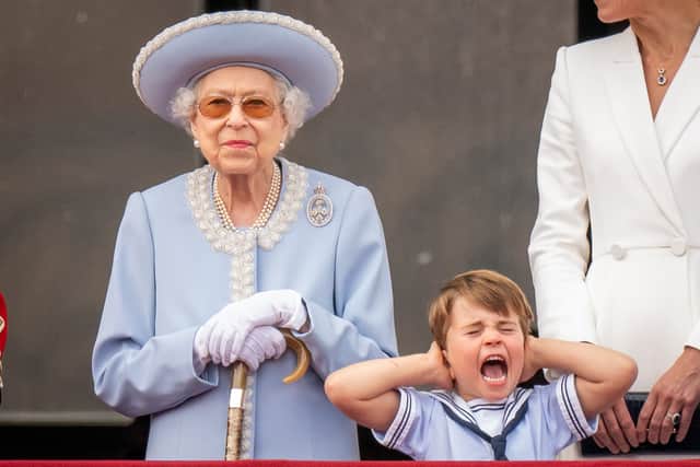 Queen Elizabeth II and Prince Louis on the balcony of Buckingham Palace after the Trooping the Colour ceremony
