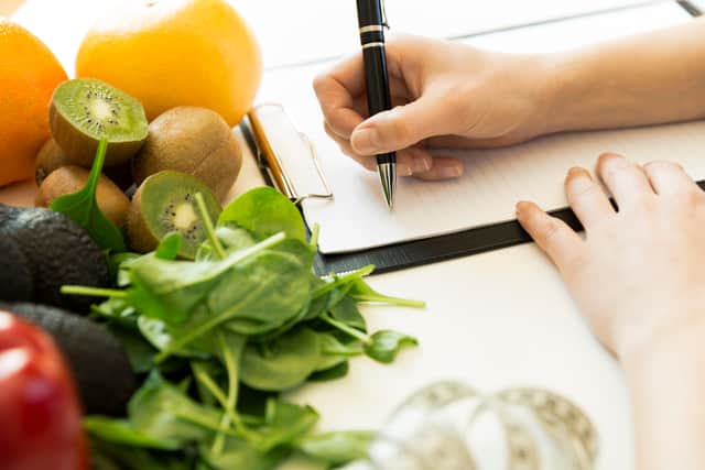 Keeping a food diary can help you monitor what you eat (Image: Adobe)