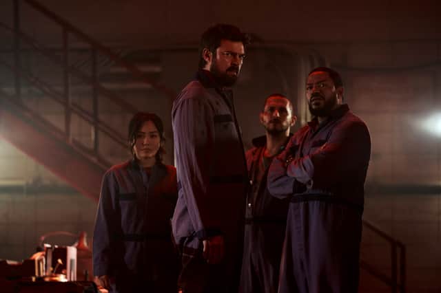 Karl Urban as Billy Buther, flanked by other members of The Boys (Credit: Prime Video)