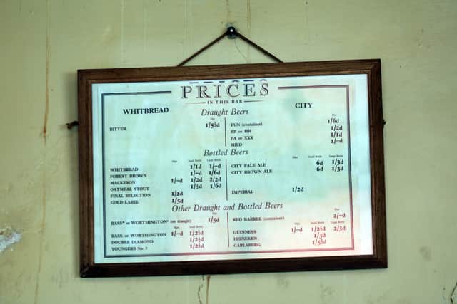 The original price list for drinks hangs in the bar of The Valiant Soldier pub in Devon. The time warp pub was left unchanged from when it closed in 1965 until reopened as museum nearly 30 years later in 1998 (Getty Images)