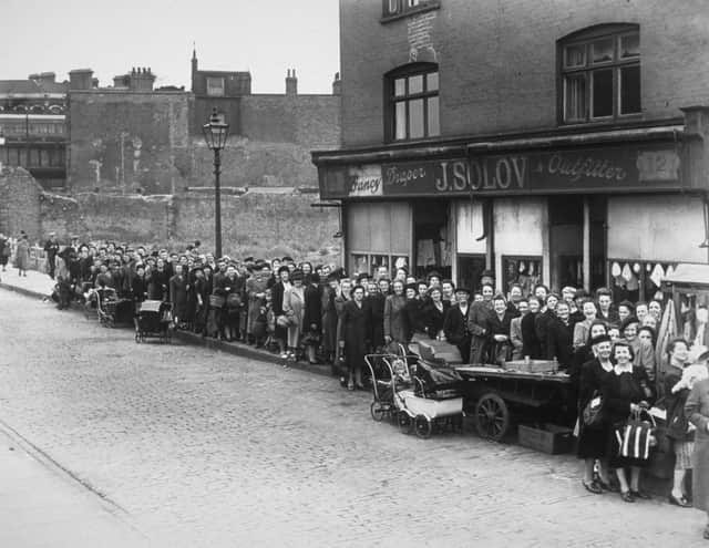 <p>People in south London queue for food during the potato shortage of 1947 (Getty Images)</p>