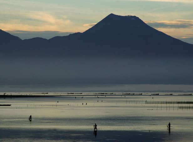 <p>Mount Bulusan, days after a previous eruption in November 2010 (Credit: Charism Sayat/AFP via Getty Images)</p>