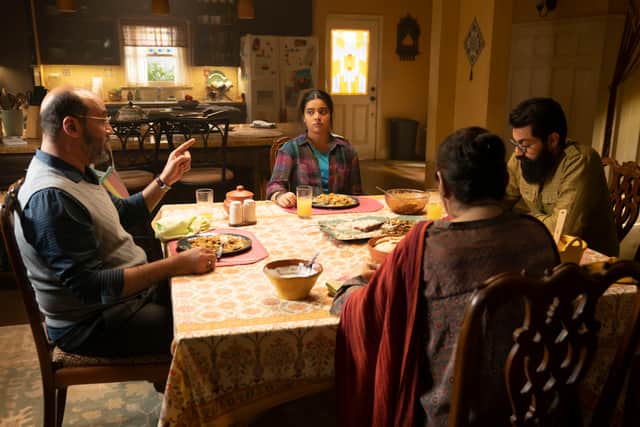 Mohan Kapur as Yusuf, Iman Vellani as Ms. Marvel/Kamala Khan, Saagar Shaikh as Aamir, and Nimra Bucha as Najma, sat around a dinner table (Credit: Daniel McFadden)