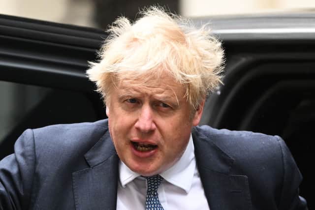 UK Prime Minister Boris Johnson returns to 10 Downing Street from the House of Commons following PMQs on May 25, 2022 in London, England (Photo by Leon Neal/Getty Images)