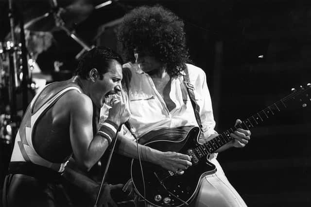 3rd September 1984:  British rock group Queen in concert with singer Freddie Mercury (Frederick Bulsara, 1946 - 1991) and guitarist Brian May (Photo by Rogers/Express/Getty Images)