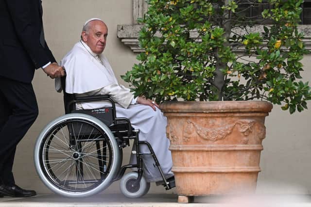 Pope Francis, seated in a wheelchair following knee treatment in June 2022 (Pic: AFP via Getty Images)