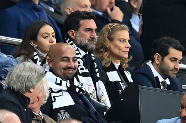 Newcastle United’s new Saudi Arabian chairman Yasir Al-Rumayyan (C) and Newcastle United’s English minority owner Amanda Staveley (centre right). 