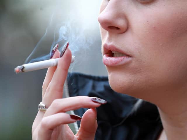 The legal age to buy cigarettes should rise from 18 in England, a review recommends 