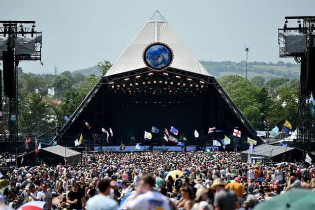 Crowds of festival-goers watch the Pyramid Stage during day three of Glastonbury Festival at Worthy Farm, Pilton on June 28, 2019 (Photo by Leon Neal/Getty Images)
