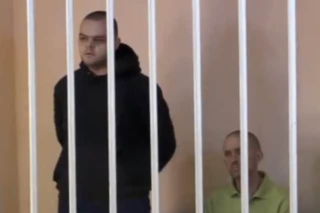 Aiden Aslin (left) and Shaun Pinner behind bars (Videograb)