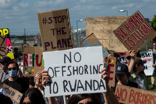 Protesters chant and hold placards against the UK deportation flights to Rwanda (Photo: Getty Images)