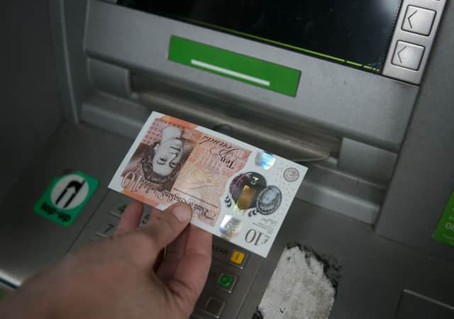 A person using a cashpoint ATM on November 3, 2017 in Bristol, England  (Photo by Matt Cardy/Getty Images)