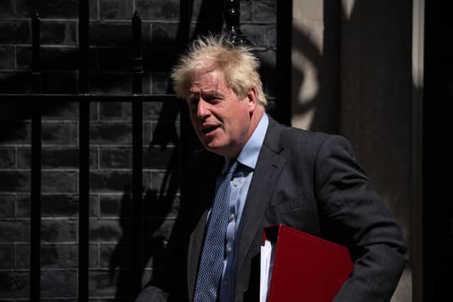 Boris Johnson, leaves to attend Prime Minister’s Questions in the House of Commons on June 15, 2022 in London, England (Photo by Carl Court/Getty Images)