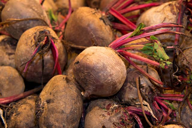 Beetroot bulbs are pictured at the fruit and vegetable department of an 'O Marche' supermarket in Saint-Francois
