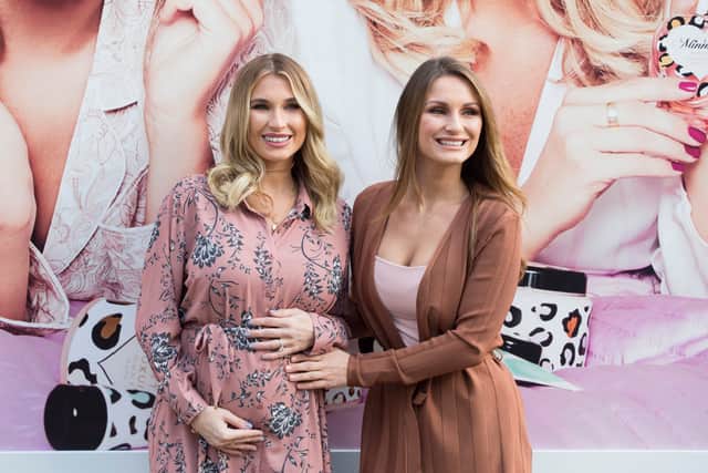 Billie Faiers pictured with her sister Sam Faiers when she was pregnant with her second child. Billie has just announced she is expecting her third baby.