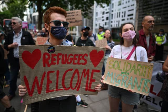People protest outside the Home Office after the Court of Appeal rejected a legal bid to stop a Home Office flight taking asylum seekers from the UK to Rwanda (Photo by Leon Neal/Getty Images)