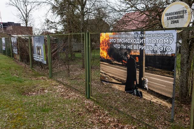 Photograph by Ukrainian photographer Maxim Dondyuk of Russia’s war in Ukraine are displayed as part of an exhibition at the railway station where the train from Moscow to Kaliningrad passes by (Pic: Getty Images)