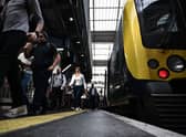 Passengers disembark a train as the biggest rail strike in over 30 years hits the UK (Photo: BEN STANSALL/AFP via Getty Images)