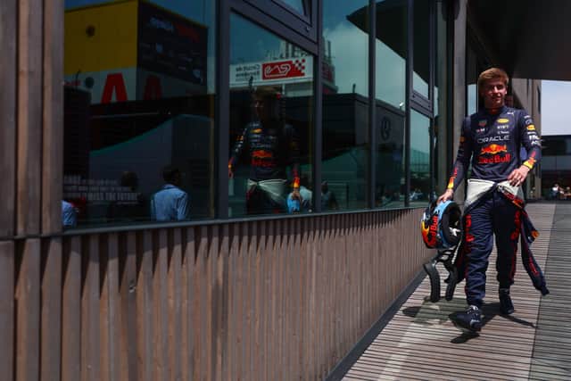Juri Vips of Estonia and Oracle Red Bull Racing walks to the garage prior to practice ahead of the F1 Grand Prix of Spain at Circuit de Barcelona-Catalunya on May 20, 2022 in Barcelona, Spain. (Photo by Mark Thompson/Getty Images)