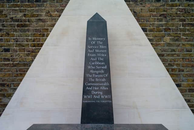 An event to mark Windrush Day takes place beside the memorial honouring the two million African and Caribbean military servicemen and women who served in World War I and World War II, in Windrush Square on June 22, 2021 in London, England (Photo by Dan Kitwood/Getty Images)