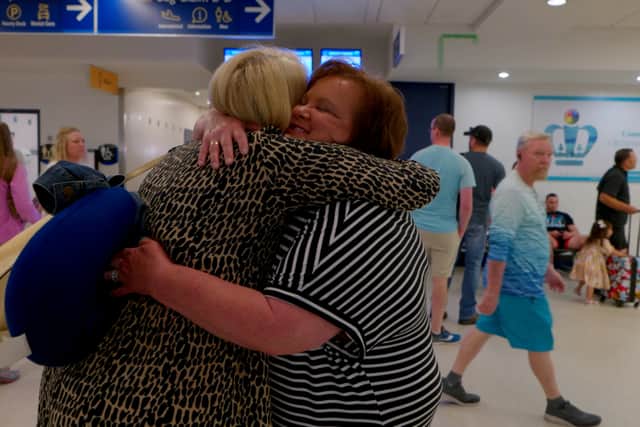 The adopted sisters lived minutes apart and reunited at Charlotte Airport (Pic: MyHeritage)