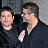 George Michael and Kenny Goss after the Japan premiere of his autobiographical movie “George Michael, A Different Story”  in 2005 (Pic: AFP via Getty Images)