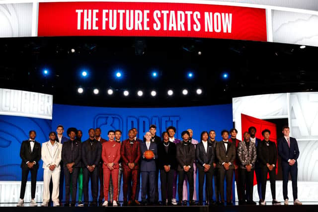 NBA commissioner Adam Silver (C) poses for photos with members of the 2022 draft class during the 2022 NBA Draft (Photo: Sarah Stier/Getty Images)