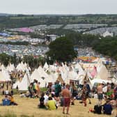 Tents are set up as festivalgoers attending Glastonbury 2022 (Pic: AFP via Getty Images)