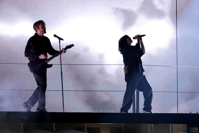 Finneas and Billie Eilish perform onstage during the 64th Annual GRAMMY Awards at MGM Grand Garden Arena on April 03, 2022 in Las Vegas, Nevada. (Photo by Matt Winkelmeyer/Getty Images)