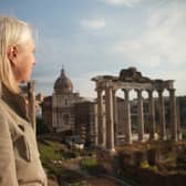 Dr. Eve MacDonald standing in front of the Forum Romanum, Rome
