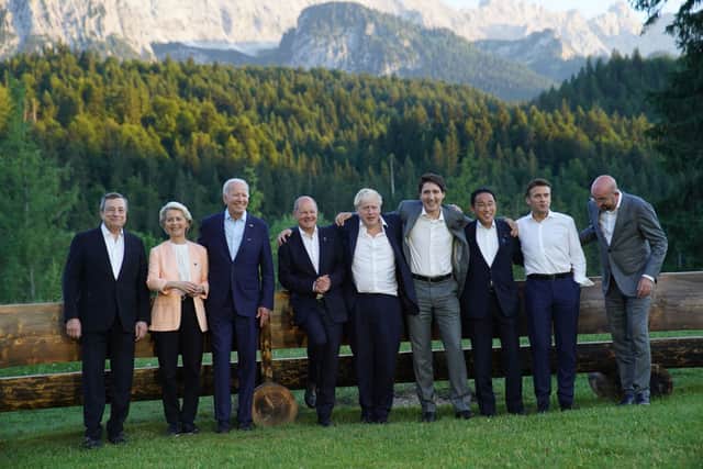 G7 leaders pose for a group photo on the first day of the three-day G7 summit at Schloss Elmau (Photo by Stefan Rousseau - Pool/Getty Images)