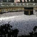 Muslims pray around the Kaaba, Islam's holiest shrine