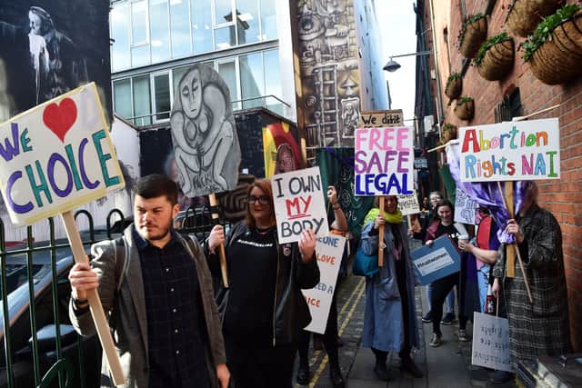 Abortion-rights demonstrators march through the streets of Belfast on October 21, 2019 in Belfast (Photo by Charles McQuillan/Getty Images)