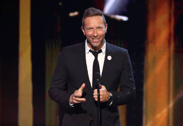 Chris Martin speaks onstage at the 2021 iHeartRadio Music Awards at The Dolby Theatre in Los Angeles, California (Photo by Kevin Winter/Getty Images for iHeartMedia)