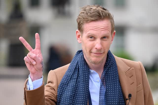 Actor Laurence Fox has hit out at fellow actor Kathy Burke after she criticised him for posting an image of a swastika made from LGBT flags on Twitter.