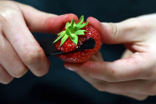 Around 154,000 strawberries are eaten every day at Wimbledon (image: Getty Images)