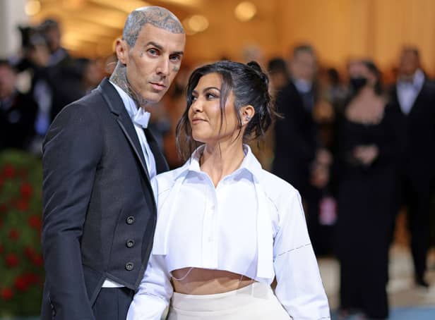 <p>Travis Barker and Kourtney Kardashian attend The 2022 Met Gala Celebrating “In America: An Anthology of Fashion” at The Metropolitan Museum of Art on May 02, 2022 in New York City. (Photo by Dimitrios Kambouris/Getty Images for The Met Museum/Vogue)</p>