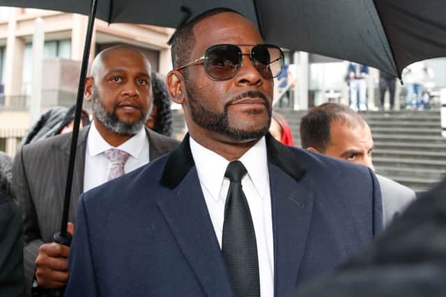 R. Kelly leaves the Leighton Criminal Court Building after a hearing on sexual abuse charges on May 7, 2019 in Chicago, Illinois (Photo by KAMIL KRZACZYNSKI/AFP via Getty Images)