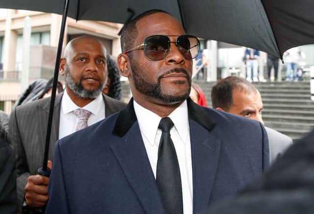 R. Kelly leaves the Leighton Criminal Court Building after a hearing on sexual abuse charges on May 7, 2019 in Chicago, Illinois (Photo by KAMIL KRZACZYNSKI/AFP via Getty Images)