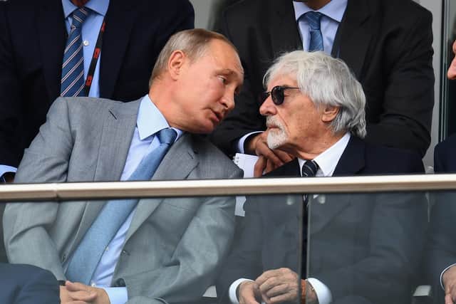 Ecclestone, right, and his friend Vladimir Putin
