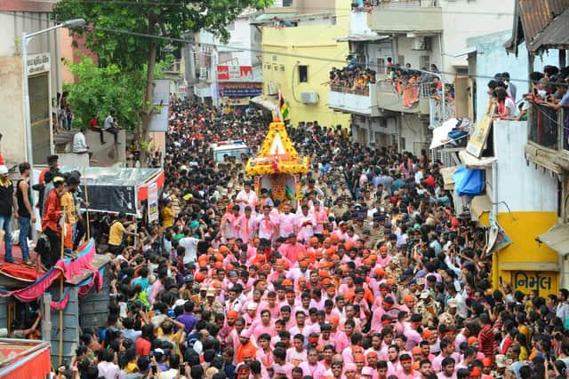 Indian Hindu devotees pull a chariot carrying the icon of Goddess Subhadra, sister of Lord Jagannath