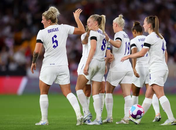England Lionesses celebrate scoring against Belgium in 2022