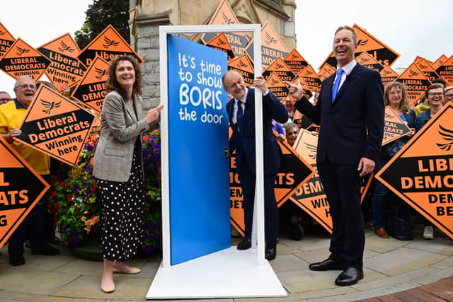 Liberal Democrats party leader Ed Davey and MP Richard Foord address supporters along with Chief Whip Wendy Chamberlain on June 24, 2022 in Tiverton, England (Photo by Finnbarr Webster/Getty Images)
