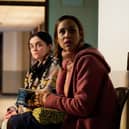 Hayley Squires as Mary and Zawe Ashton as Mary, waiting together in a non-descript corridor (Credit: BBC)