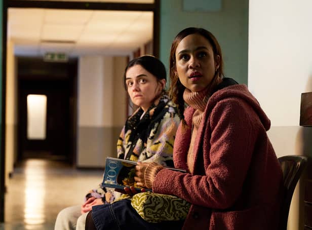 <p>Hayley Squires as Mary and Zawe Ashton as Mary, waiting together in a non-descript corridor (Credit: BBC)</p>