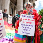 Gay rights activists listen as speeches are made during an event to mark 50 years since the first UK Pride March at Trafalgar Square on July 01, 2022 in London, England (Photo by Leon Neal/Getty Images)