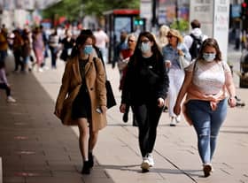 Brits have been urged to wear face masks in crowded and enclosed spaces (Photo: Getty Images)