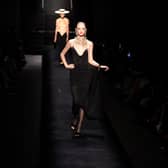 A model presents a creation for Schiaparelli during the Haute Couture Spring-Summer 2023 show at the Fashion Week in Paris on July 4, 2022 (Getty Images)