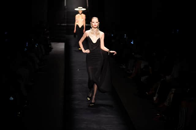 A model presents a creation for Schiaparelli during the Haute Couture Spring-Summer 2023 show at the Fashion Week in Paris on July 4, 2022 (Getty Images)